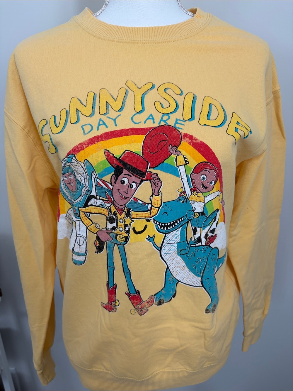 Yellow 'Sunnyside Day Care' Toy Story Graphic Sweatshirt